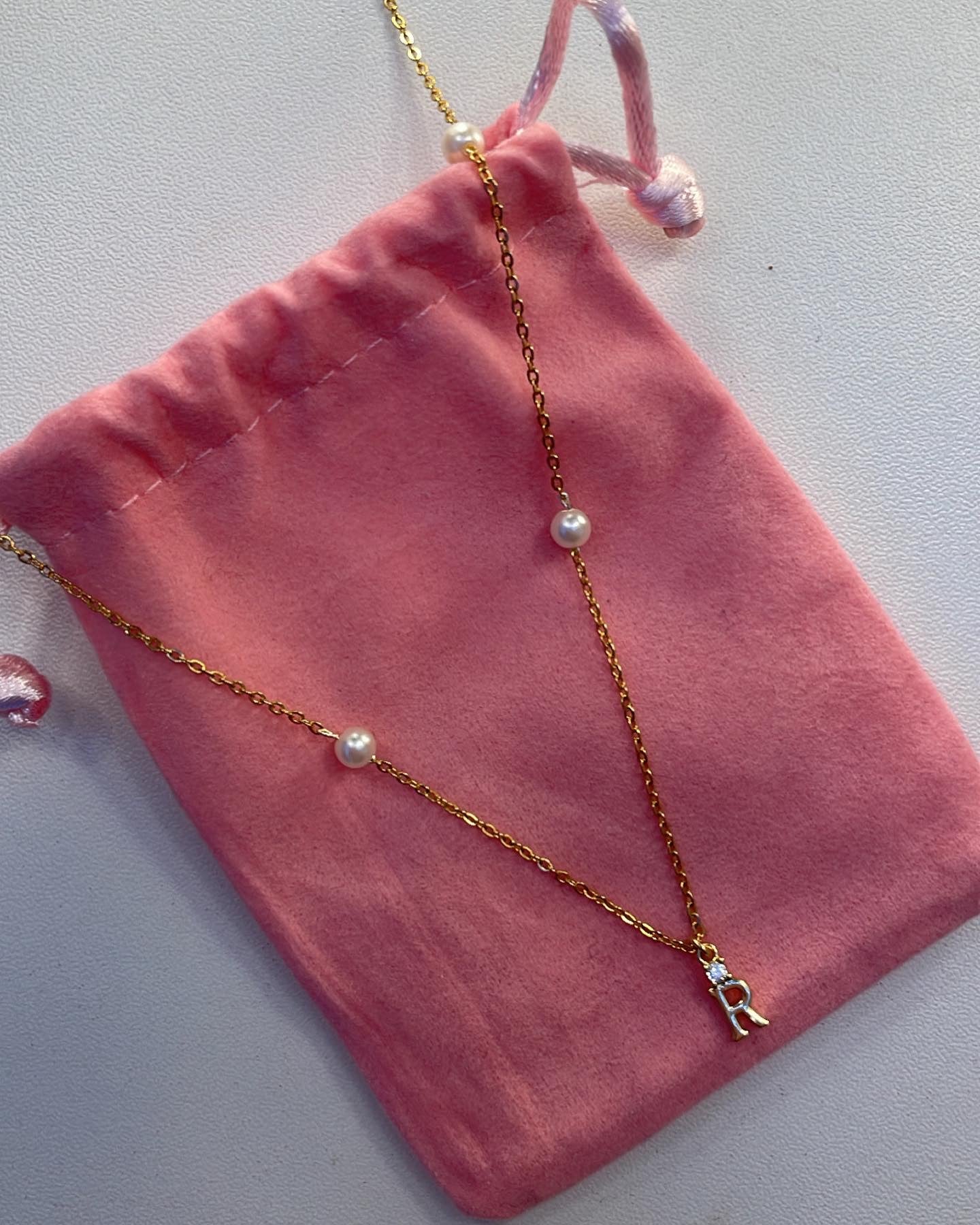 Diamanté Initial pearl necklace